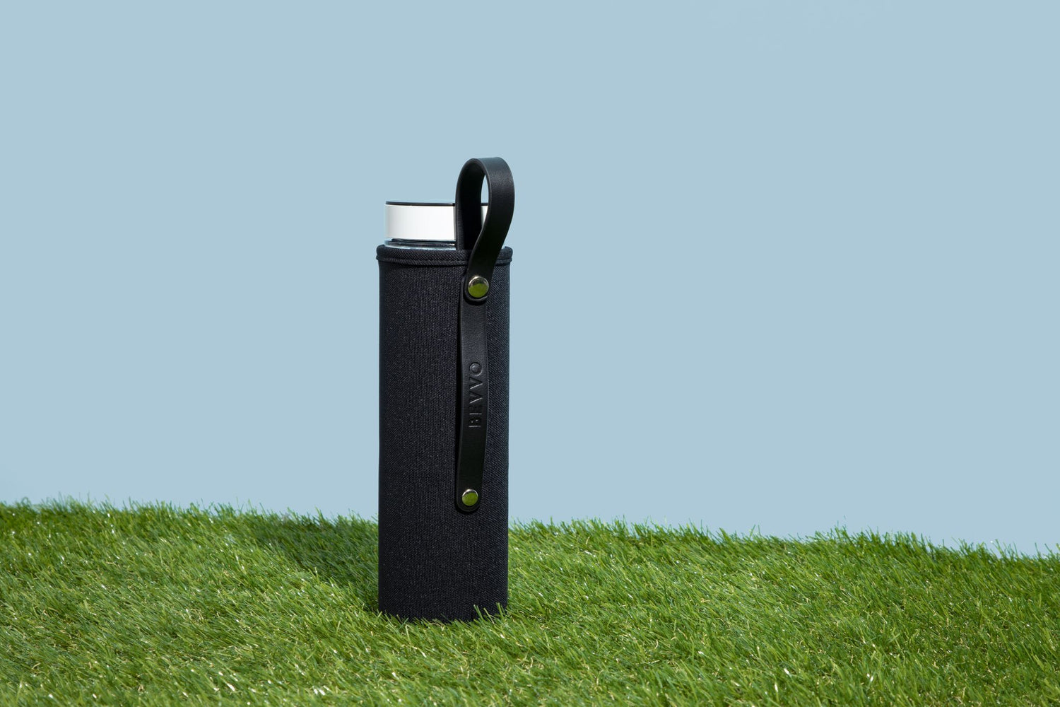 BEVVO Adventure Bundle with BEVVO Blender and Carrying Sleeve pictured on green grass with blue backdrop